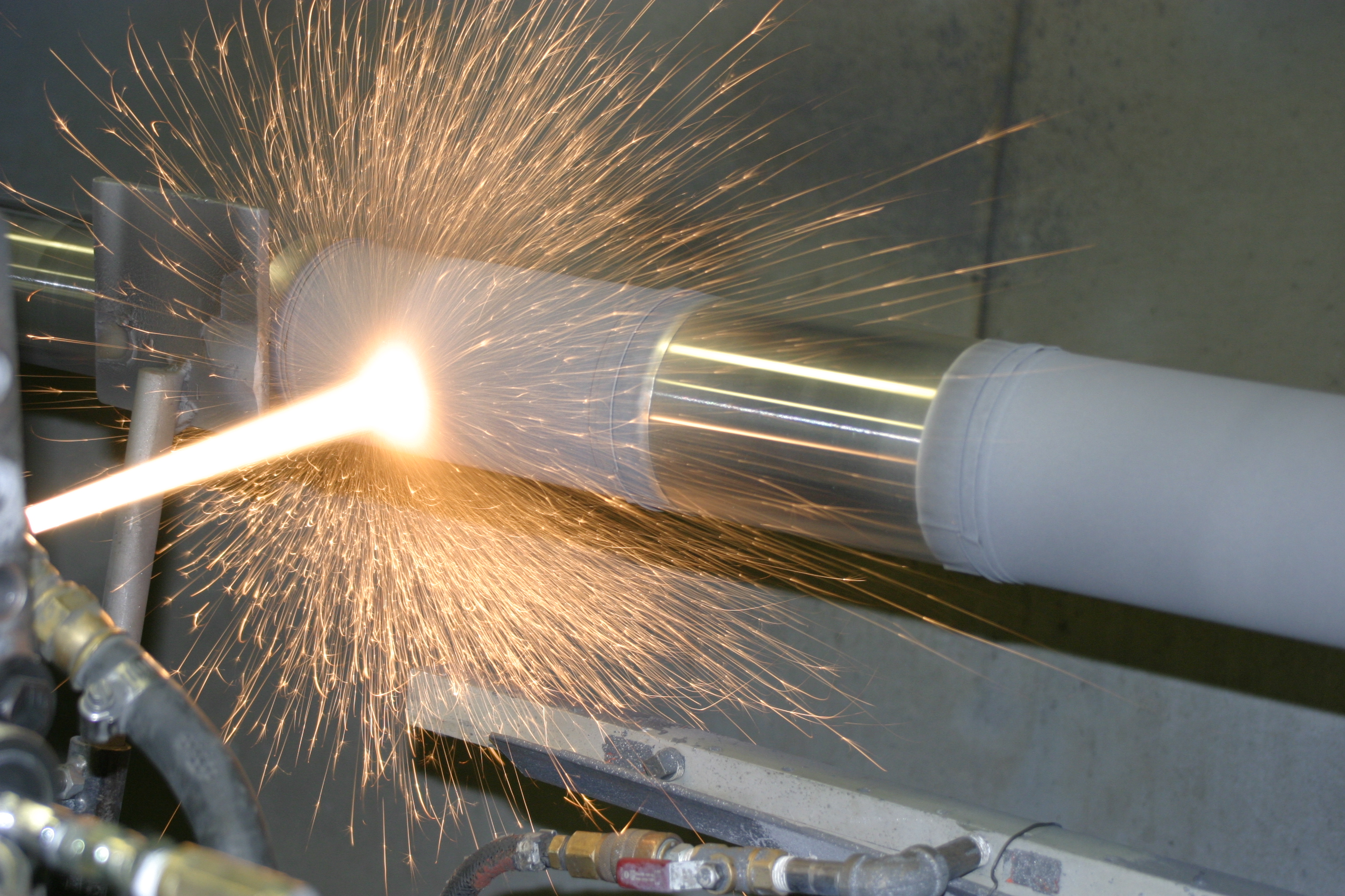 HFW Industries applying a carbide HVOF coating to a turbine shaft. This is a direct hard chrome plating alternative.