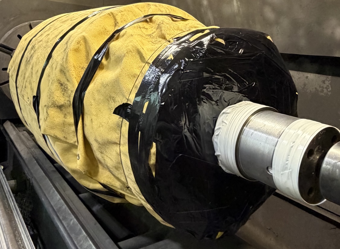 Rotors thoroughly masked and protected for blasting and coating.