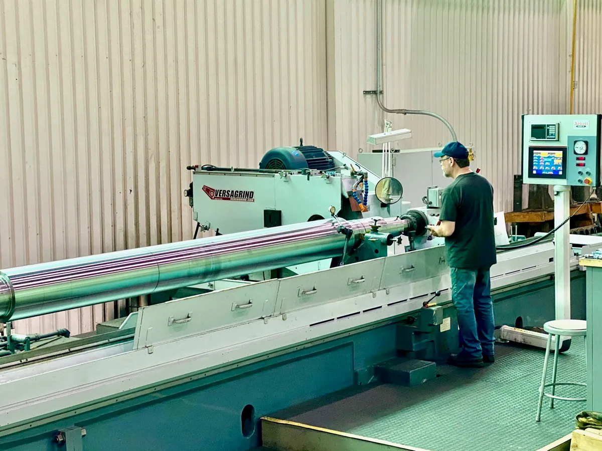 Cylindrical grinder finishing a compressor shaft at HFW Industries Cylindrical grinder finishing a compressor shaft at HFW Industries for turbo-compression repair and precision grinding applications