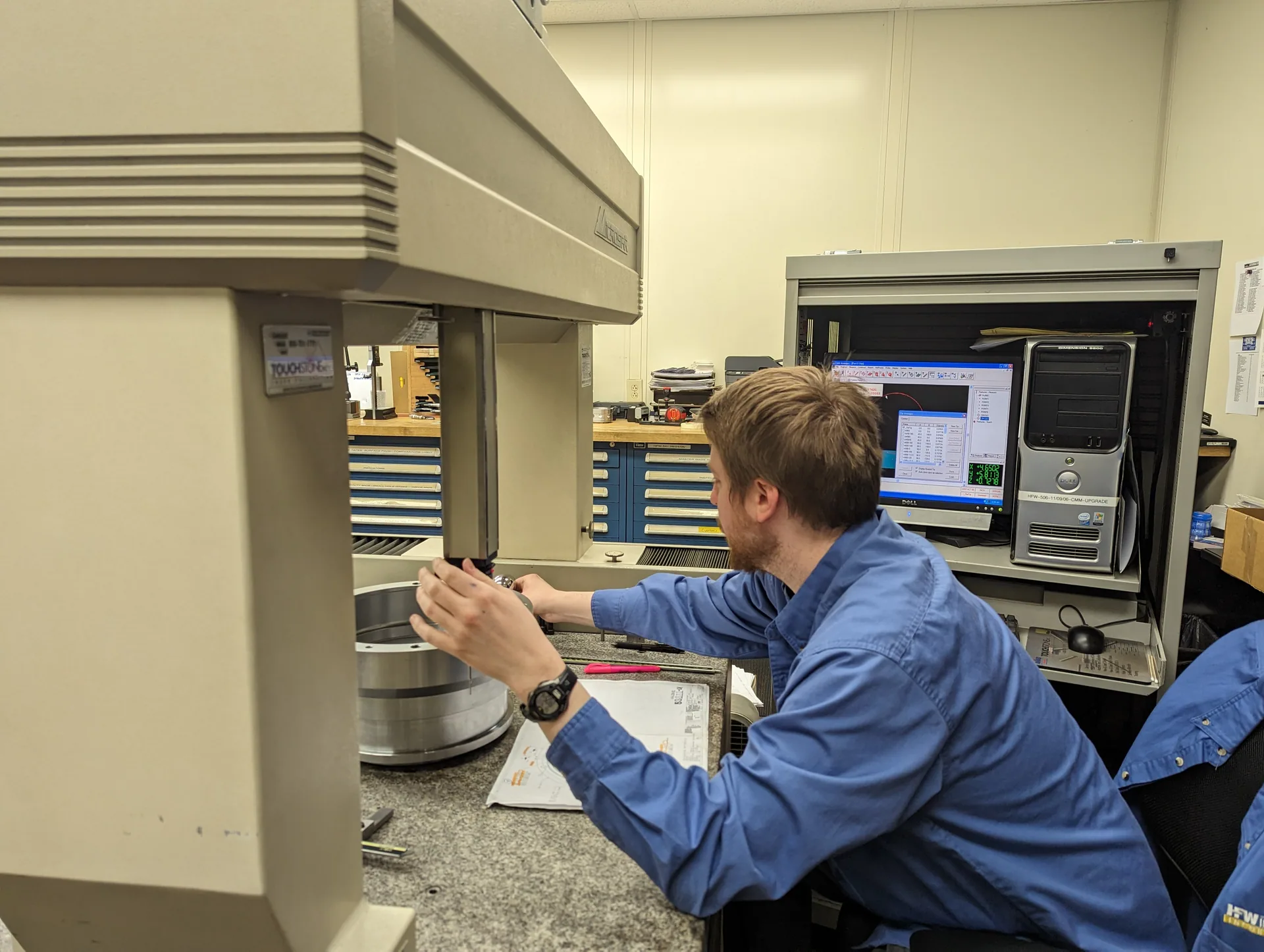 CMM inspection of a newly manufactured industrial component at HFW Industries