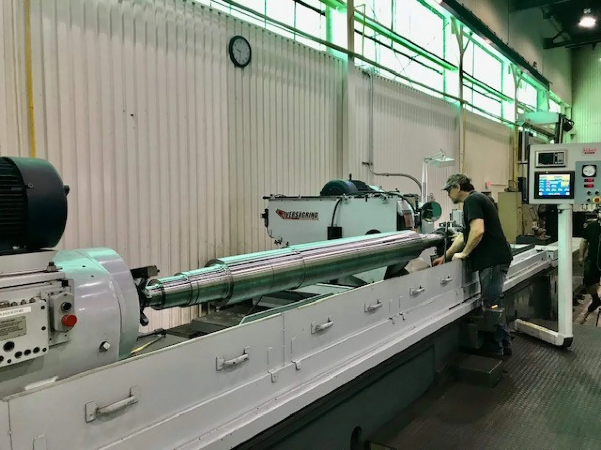 Precision cylindrical grinding of a turbine shaft at HFW Industries