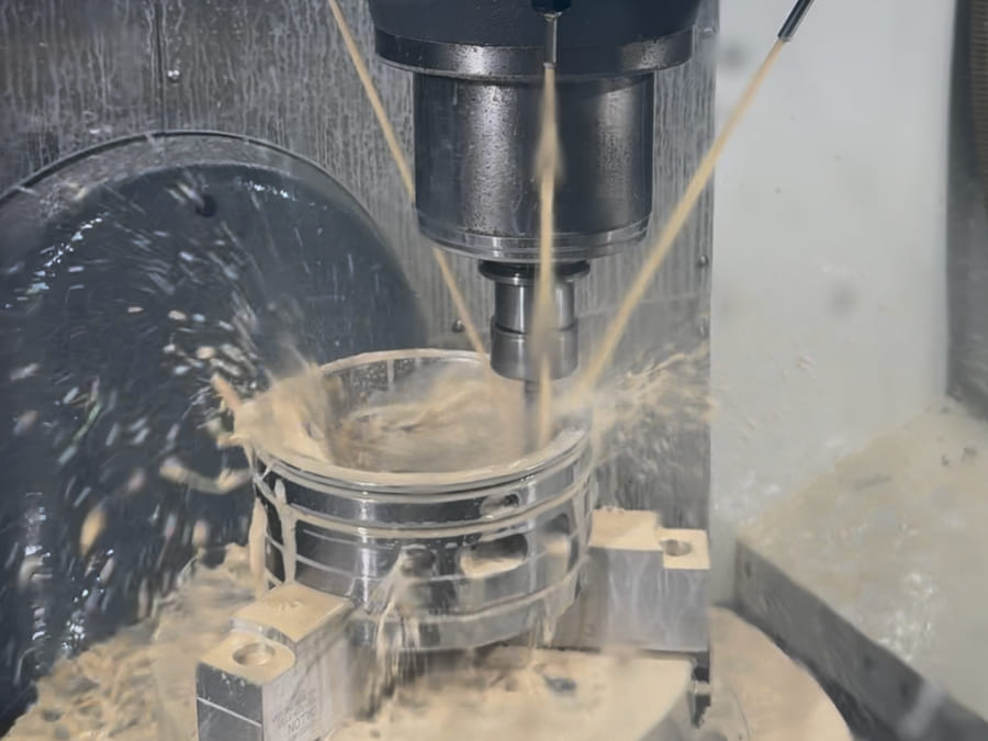 Five-axis CNC machining of a complex flanged industrial housing at HFW Industries