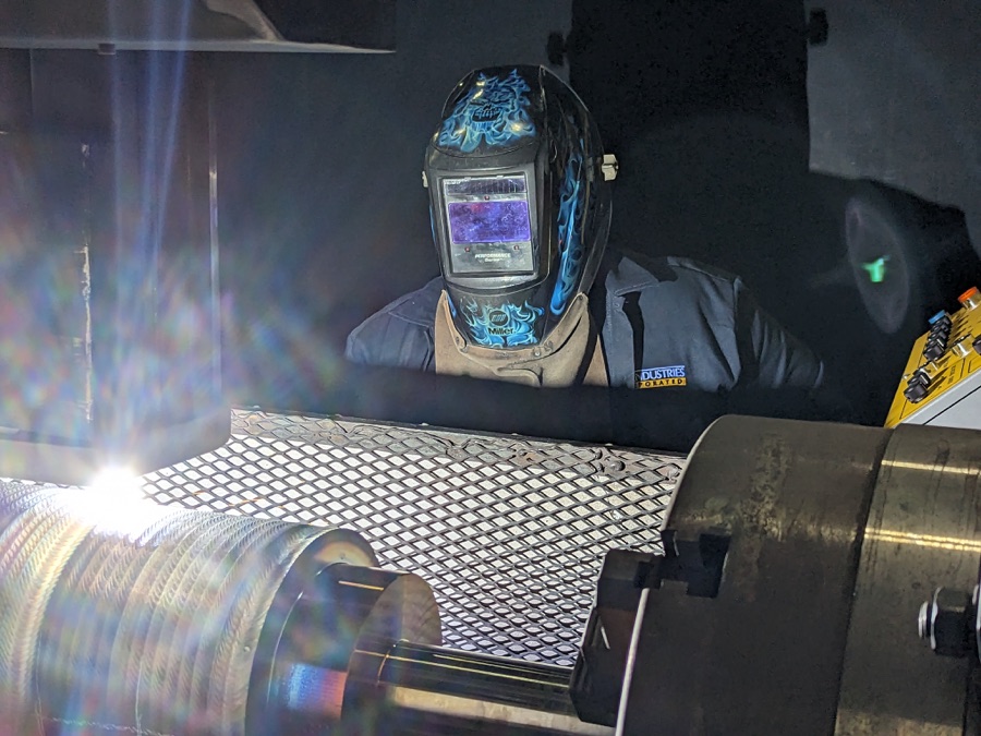 Hardfacing weld overlay applied to an industrial component at HFW Industries