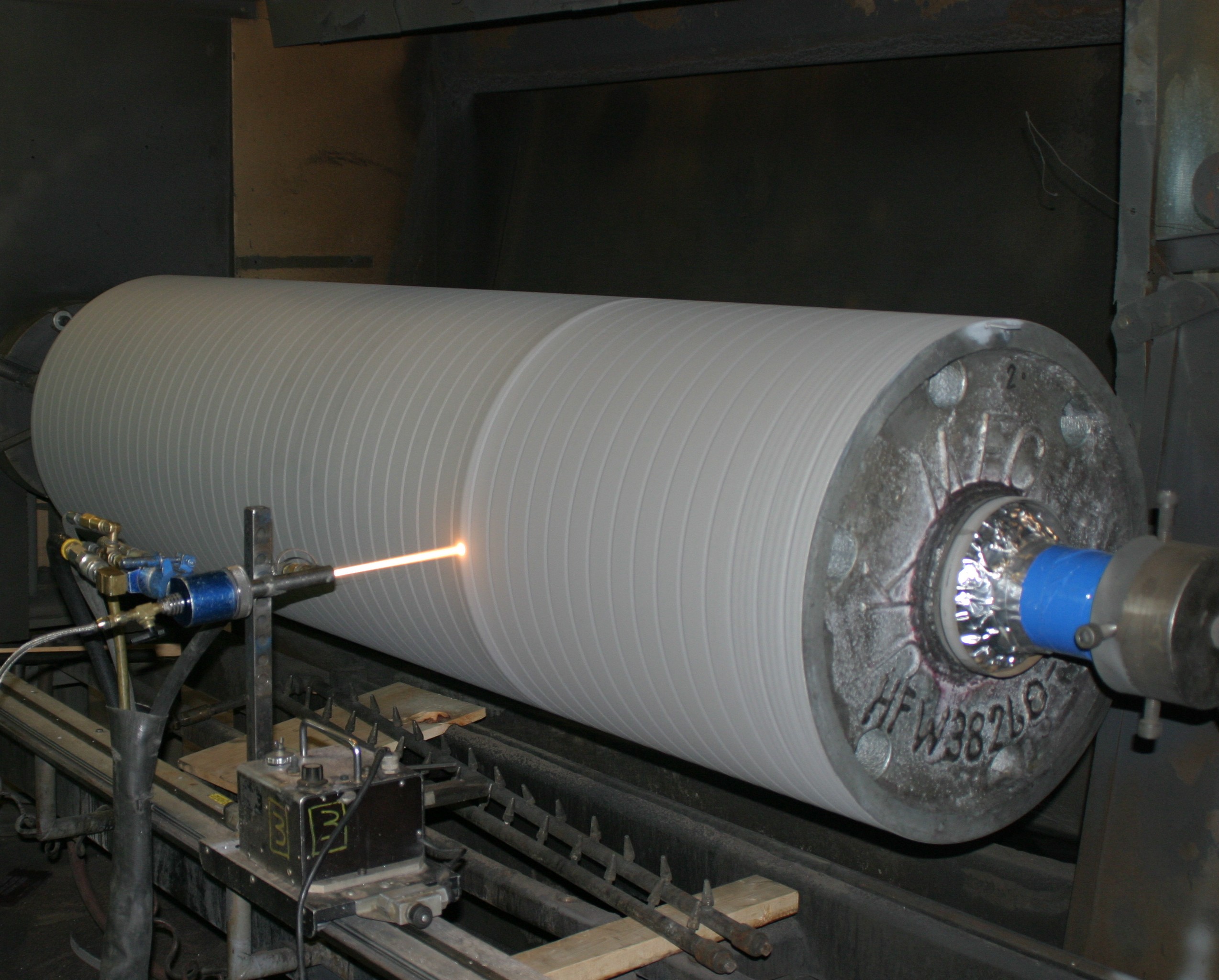 HVOF thermal spraying of a roll.